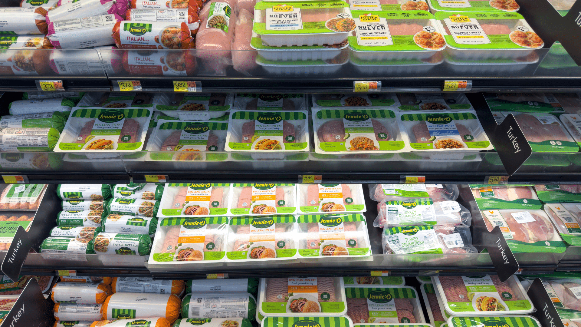 Grocery store freezer section showing various turkey brands