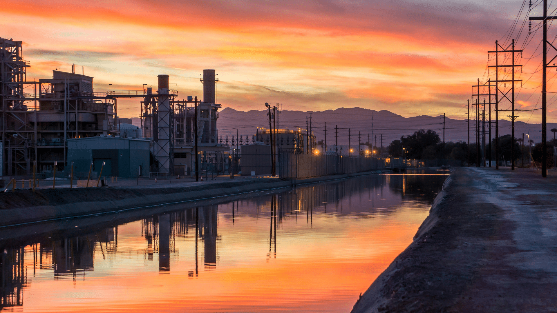 Industrial building near water during sunset in Jonesboro, Arkansas