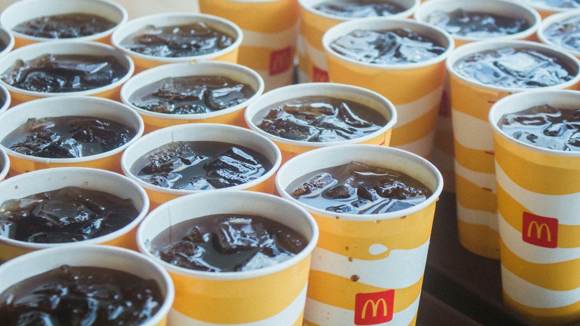 Group of cups with sweet tea on a table