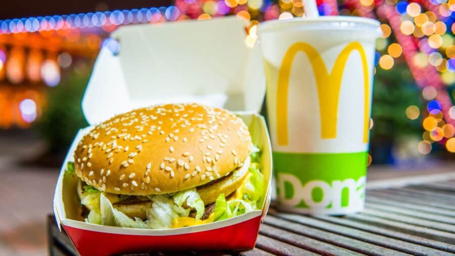 McDonald's Big Mac with Coca Cola, night, Christmas tree in background, McDonald's was founded in 1940 as restaurant operated by Richard and Maurice McDonald in USA