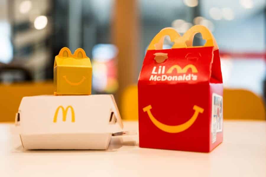 A toy of Gold Happy Meal Box from Mcdonald's Happy Meal 2025 Little McDonald's