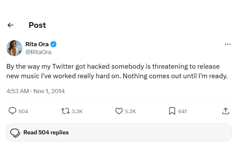 A tweet from a verified account on November 1, 2014, mentions a Twitter hack and a threat to release unreleased music. Icons below show engagement. Tweet reads: By the way my Twitter got hacked somebody is threatening to release new music I've worked really hard on. Nothing comes out until I'm ready."