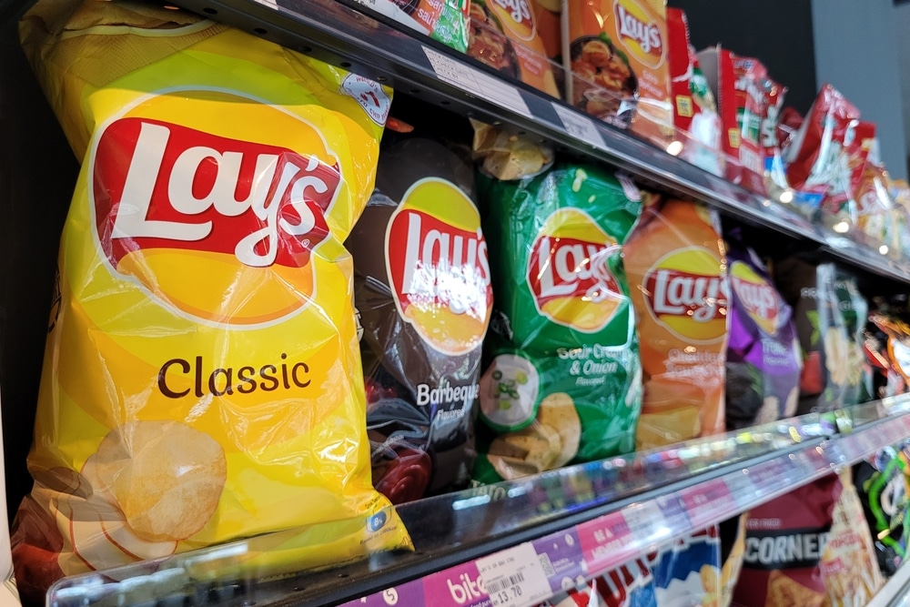 Various Lay's Potato chips flavors on store shelf