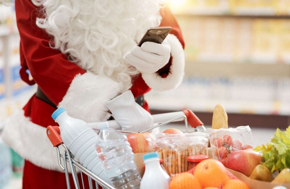 Santa Claus doing grocery shopping at the supermarket