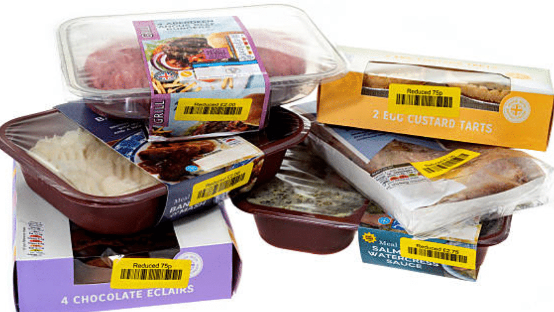 Stack of discounted packaged foods with yellow reduced price labels.