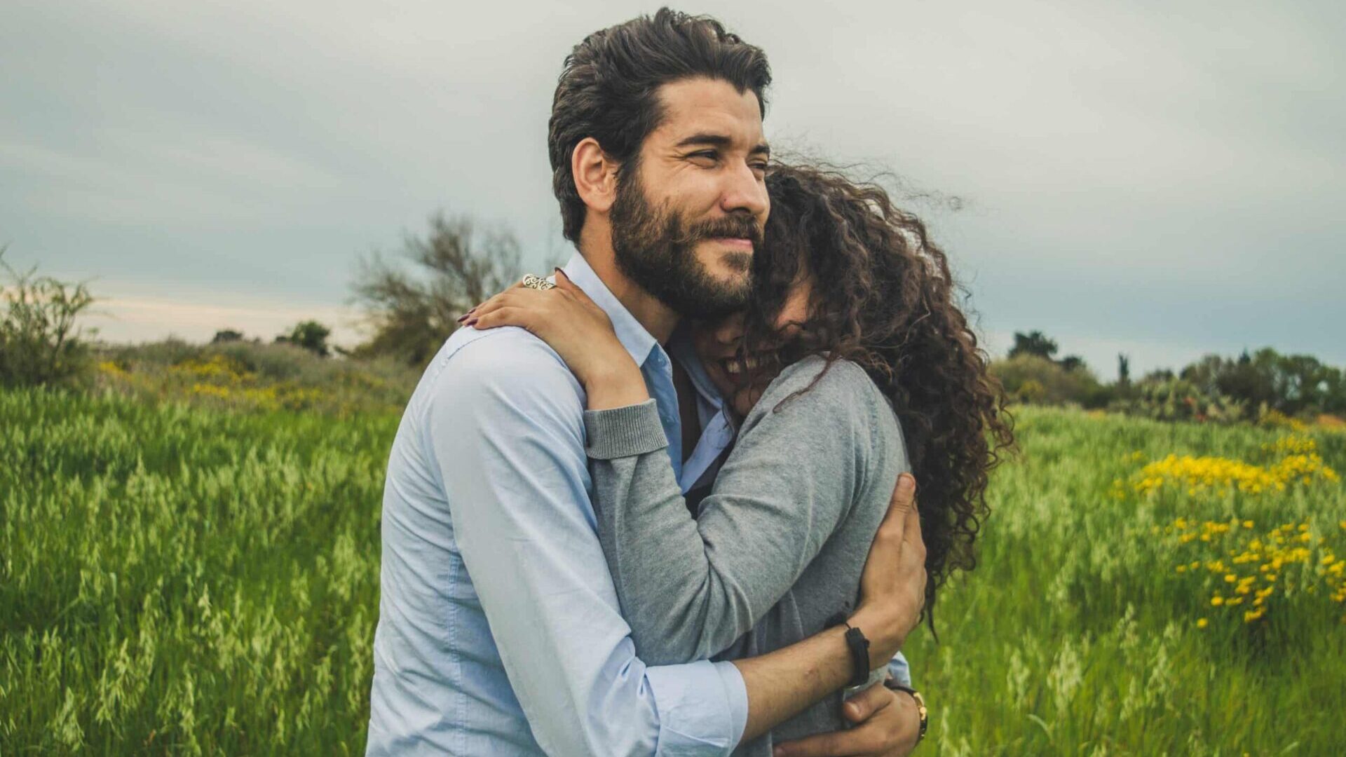 Man and Woman hugging each other.
