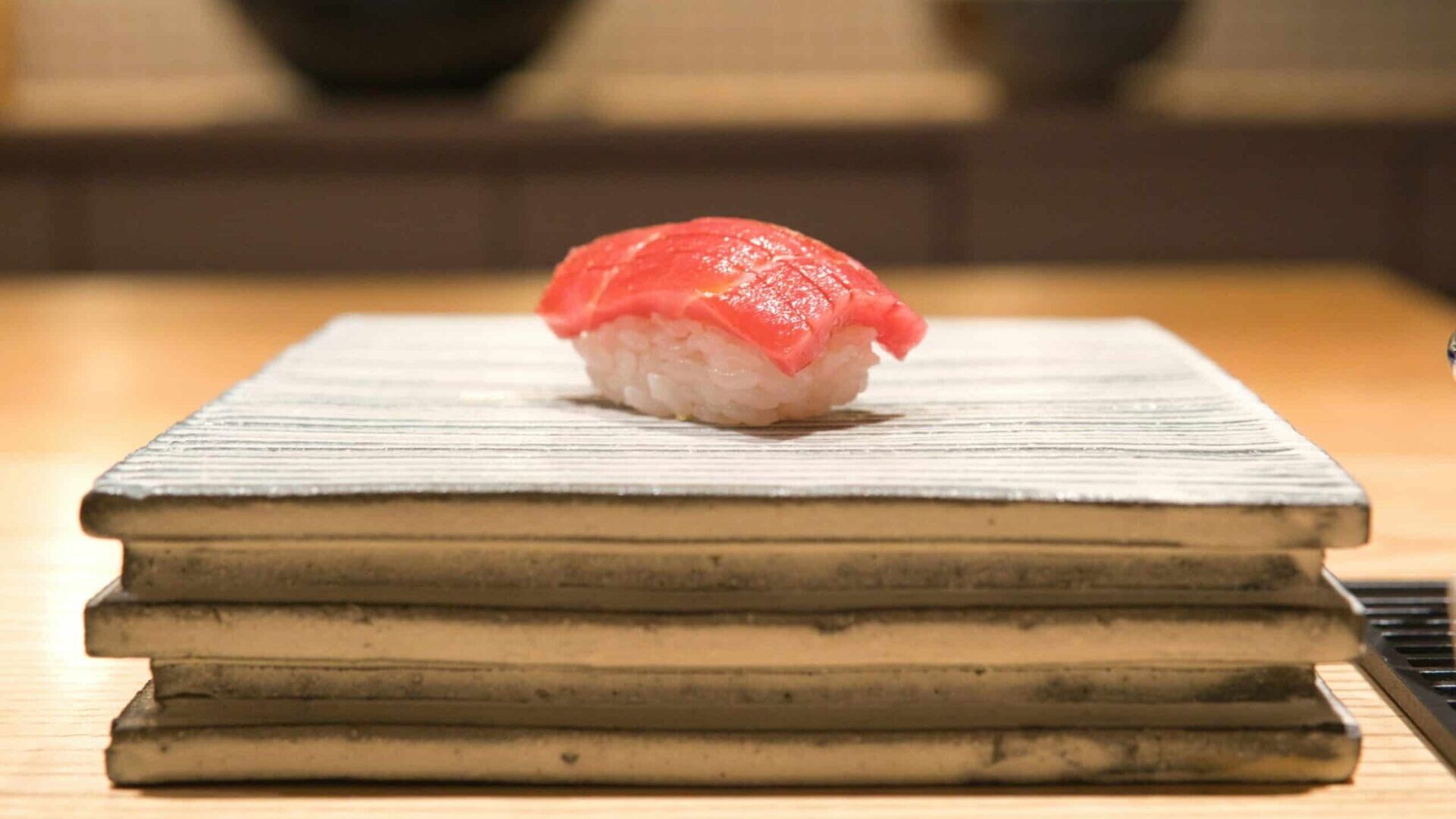 White and red ice cream served on white paper.