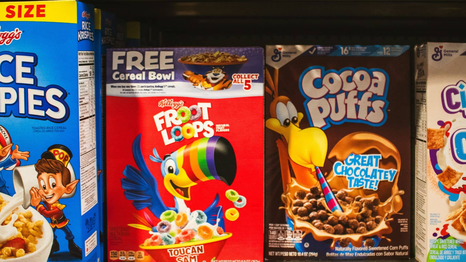 Boxes of breakfast cereal displayed on supermarket shelves