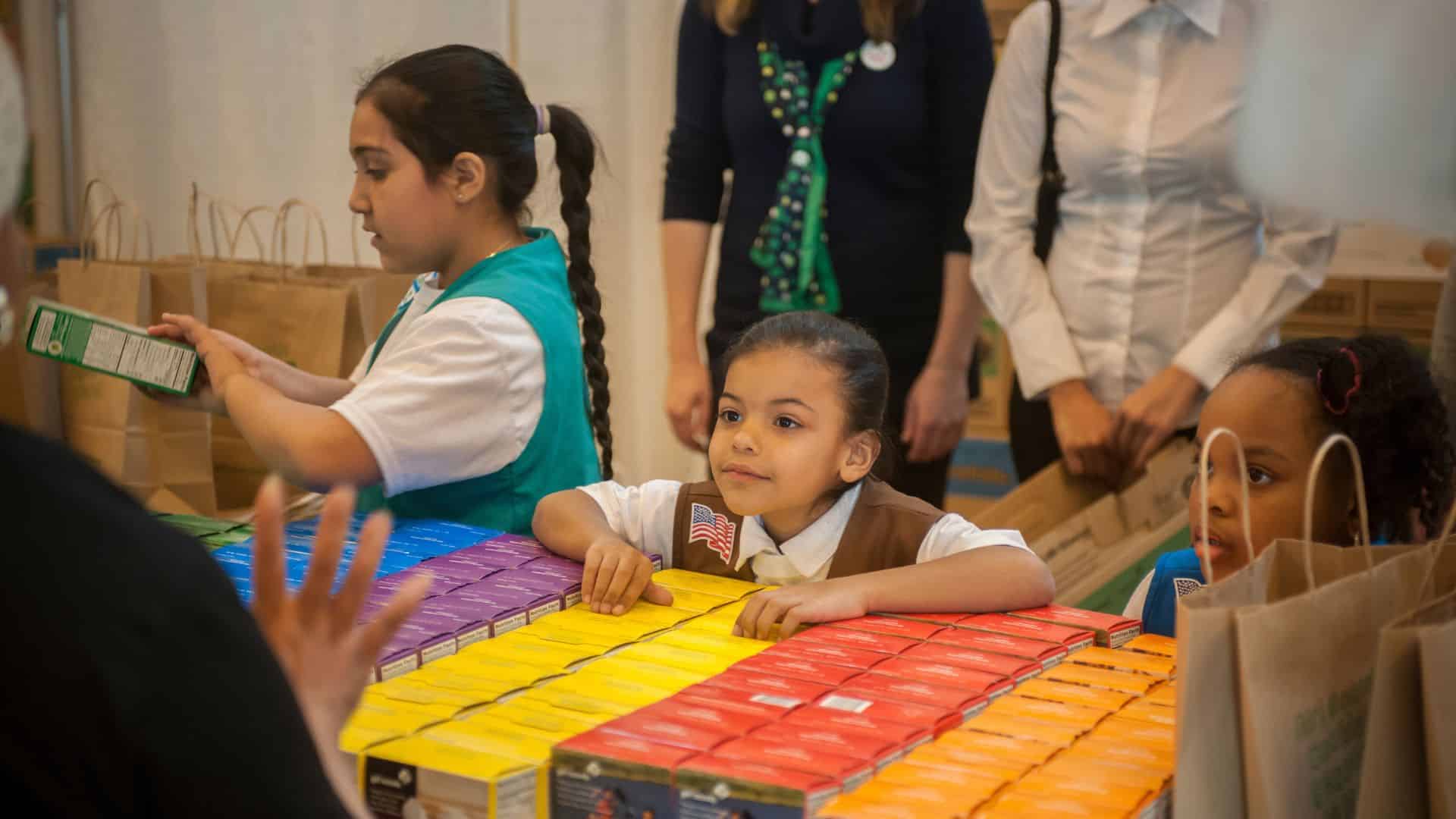 Girl Scouts selling cookies