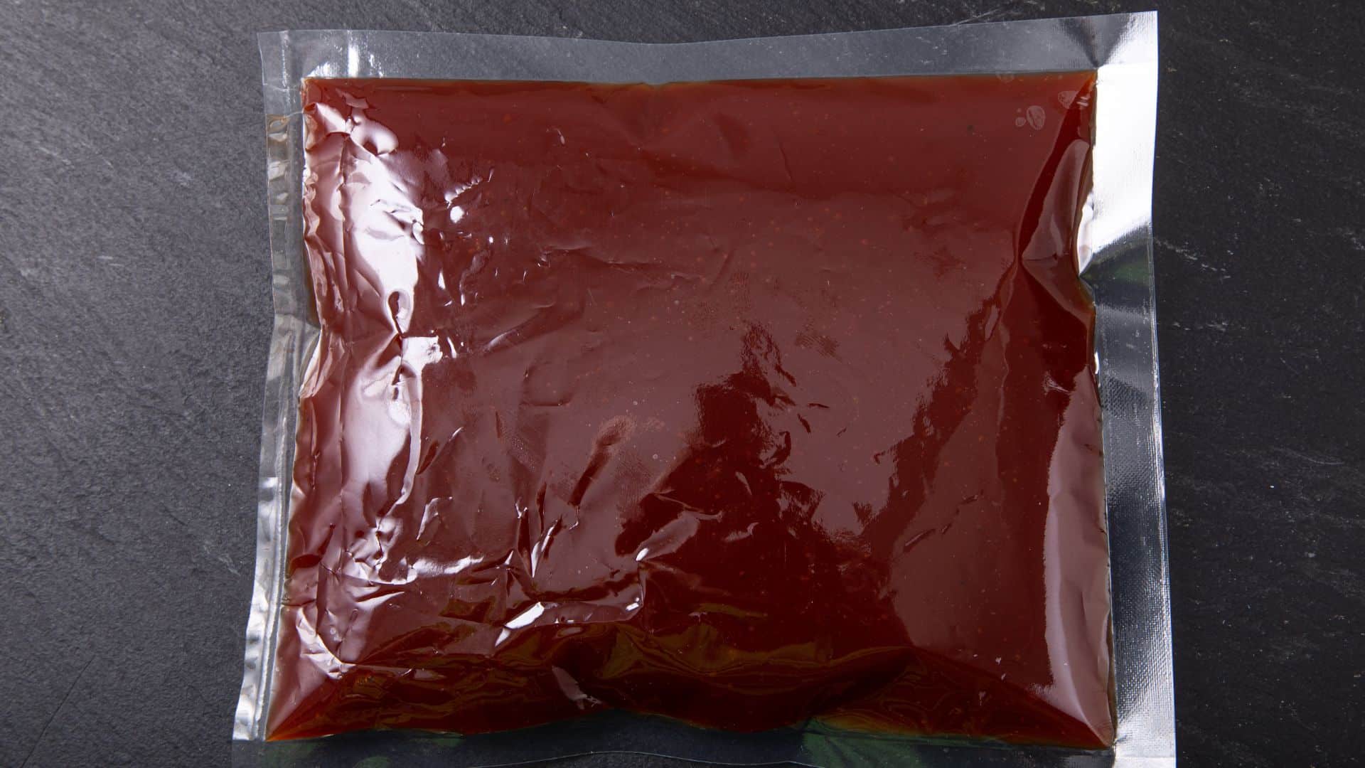 Stock photo of sauce in vacuum sealed plastic bag
