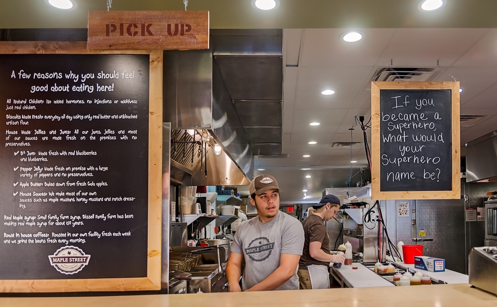 Employees make biscuits at Maple Street Biscuit Company in St. Augustine, Florida