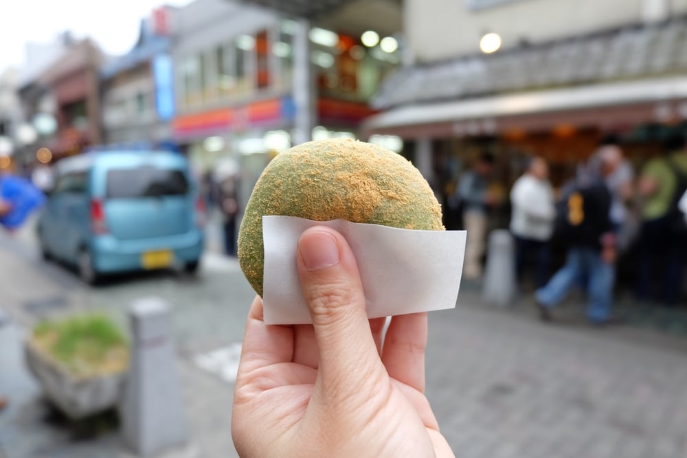 Mochi on a person's hand in Nara, Japan (famous mochi city)