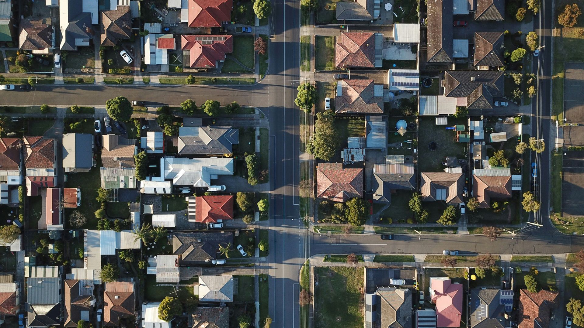 Aerial view of residential houses in a neighborhood during daylight