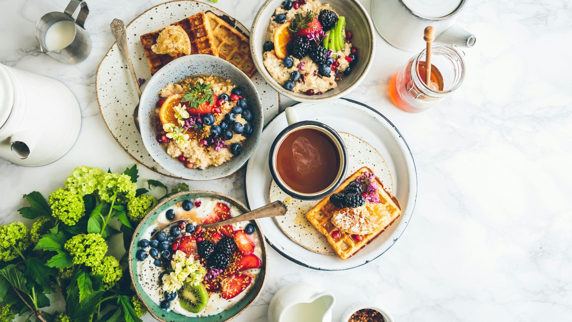 Bowl of fresh fruit salad served as part of a balanced breakfast.