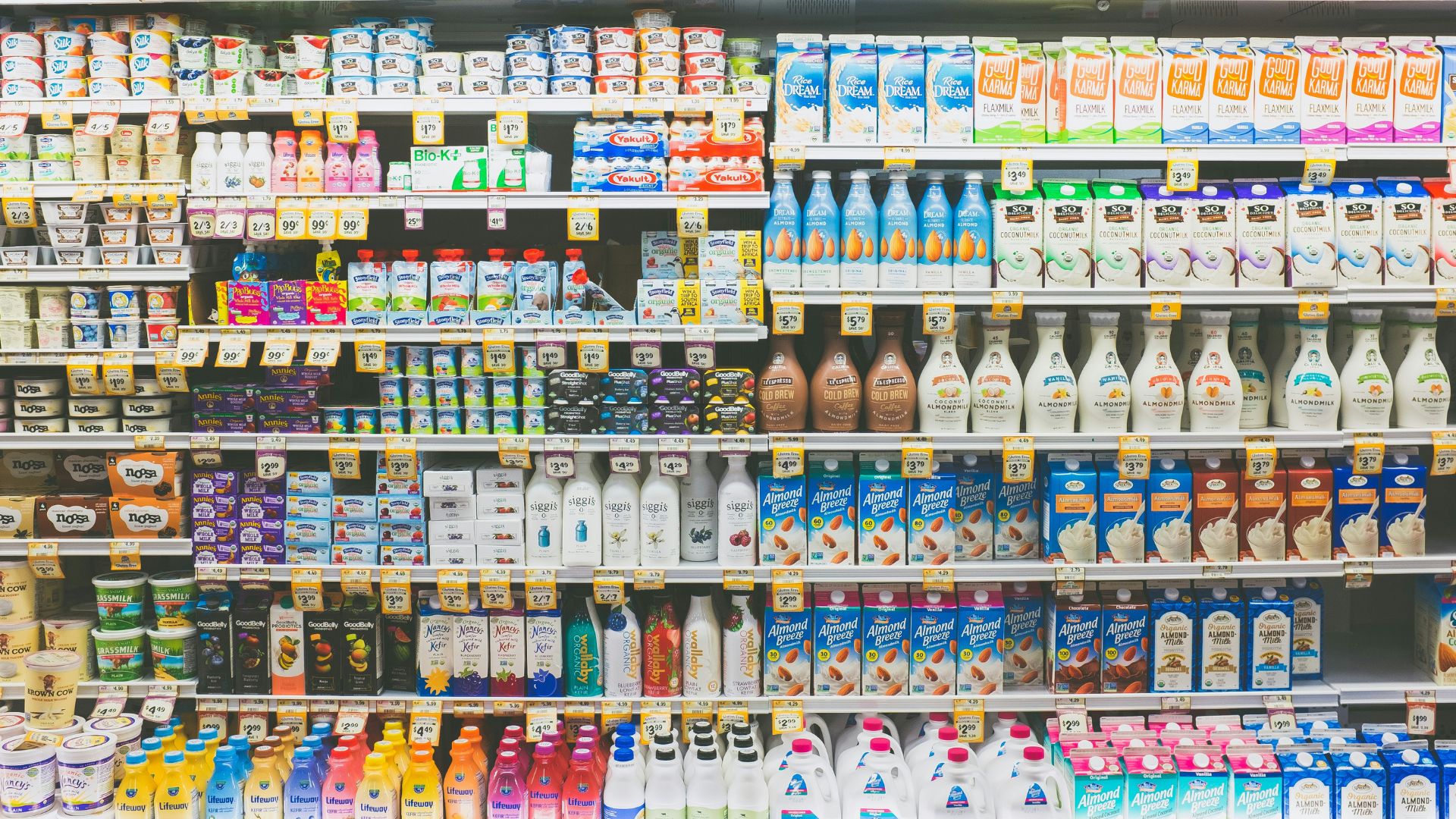 Beverage products displayed inside a commercial grocery refrigerator
