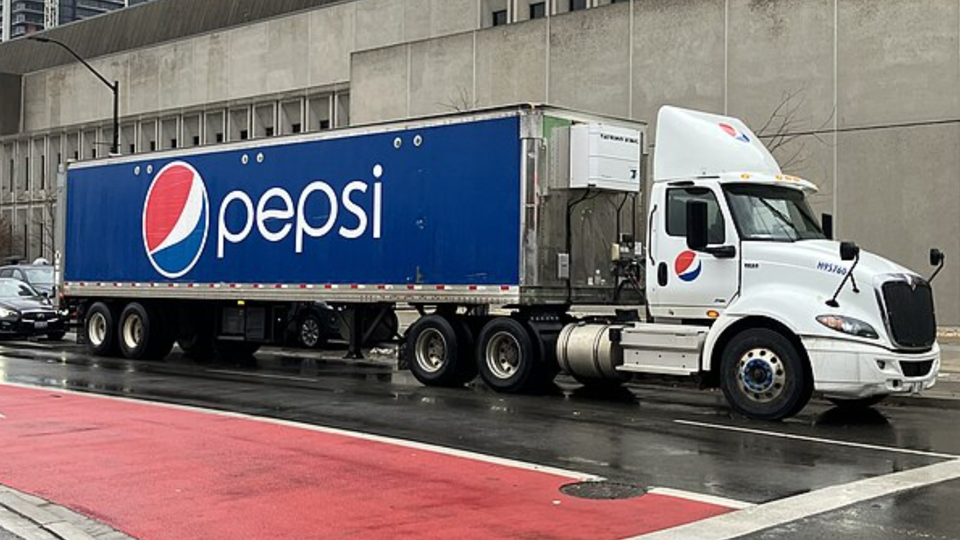 Pepsi truck in the street