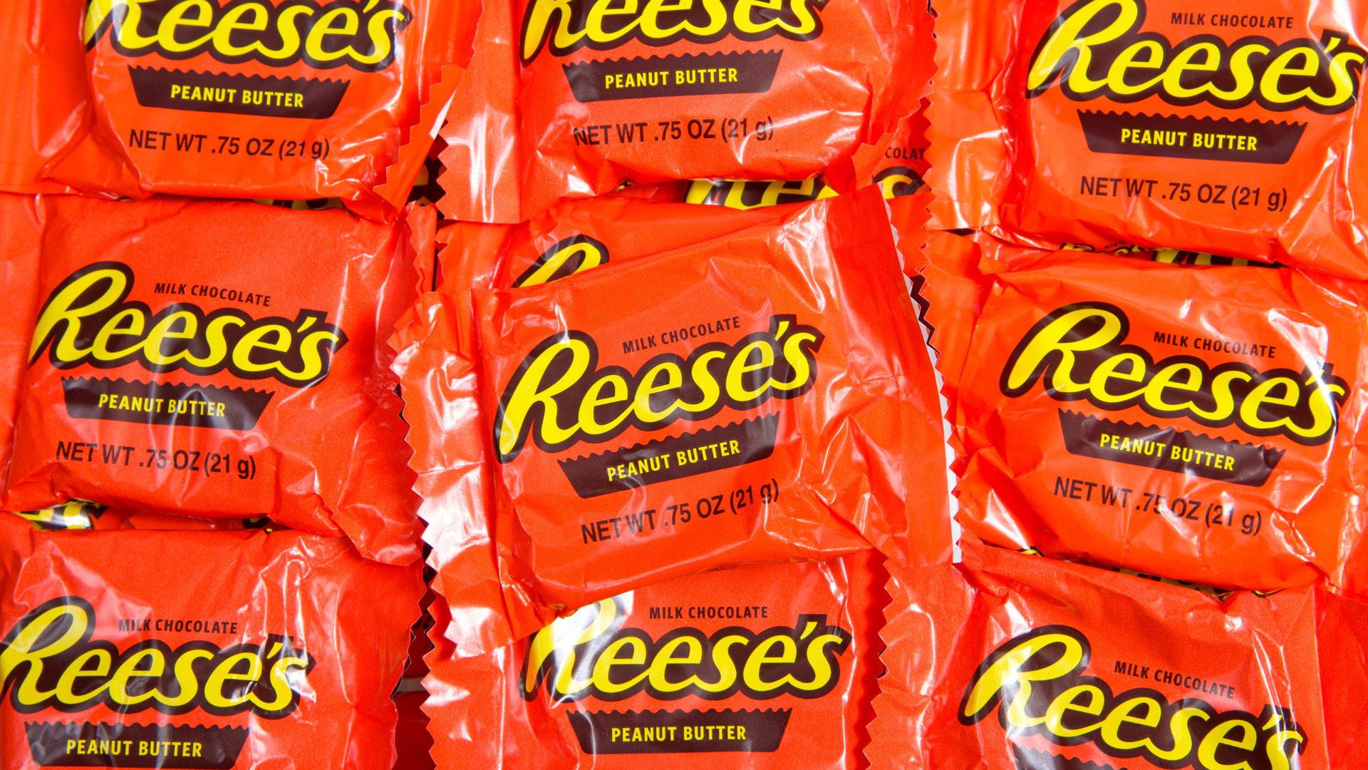 Top view flat lay of Reese's Peanut Butter cups, individual fun sized treat bags.