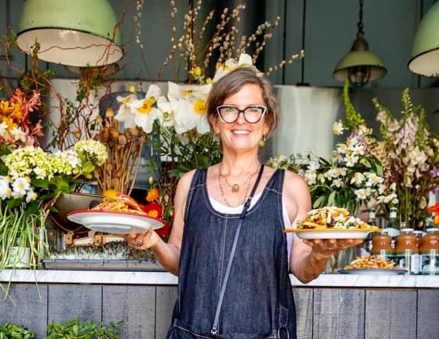 Owner Kendra Kolling poses inside The Farmer's Wife's sandwich shop