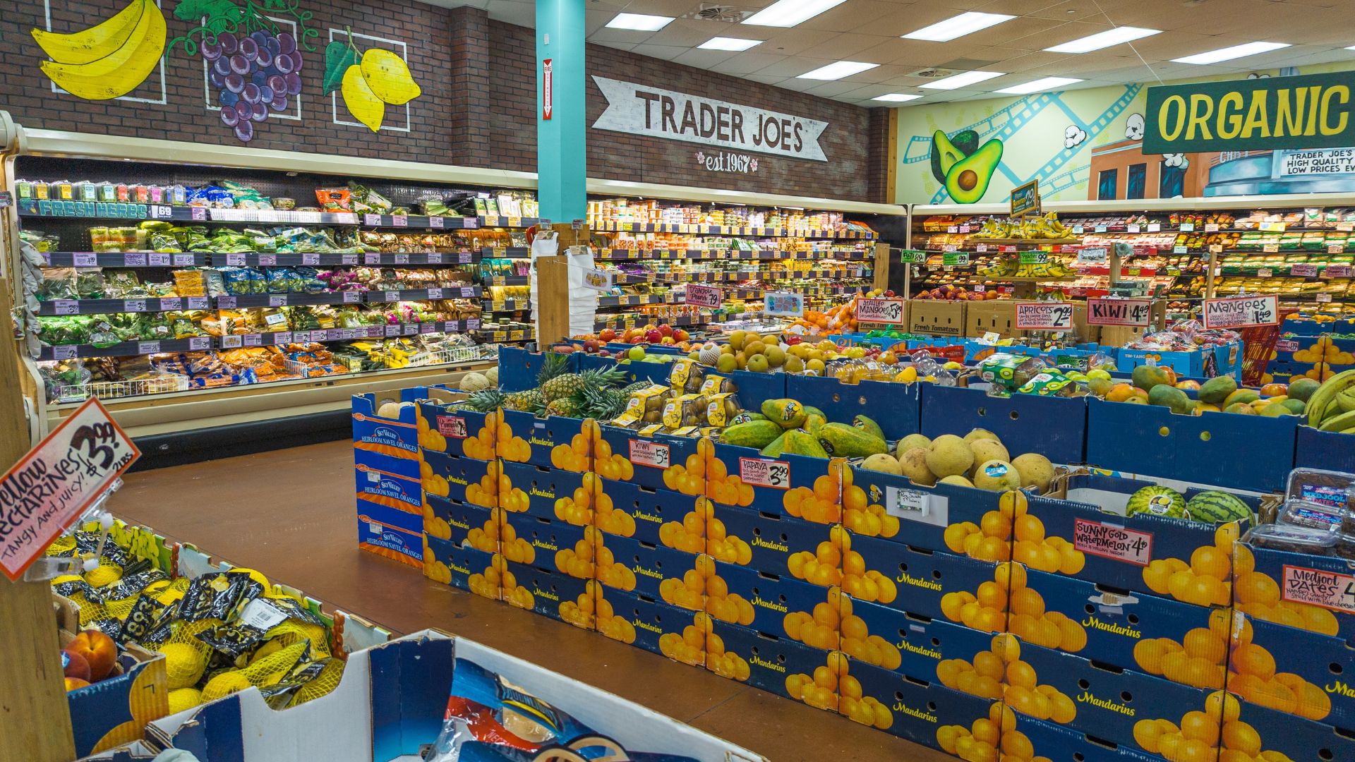 Frozen Trader Joe’s chicken and vegetable fried rice bags displayed in a grocery store freezer section