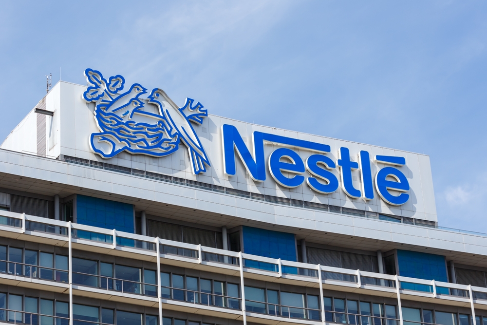 Nestlé logo displayed on the exterior of a company building.