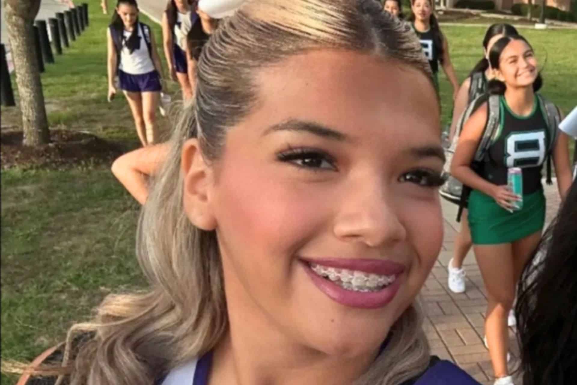 Larissa Nicole Rodriguez smiling in a selfie with classmates outdoors in an undated picture.
