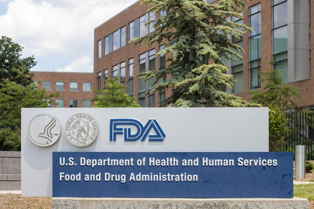 Food and Drug Administration sign outside U.S. Department of Health and Human Services building.