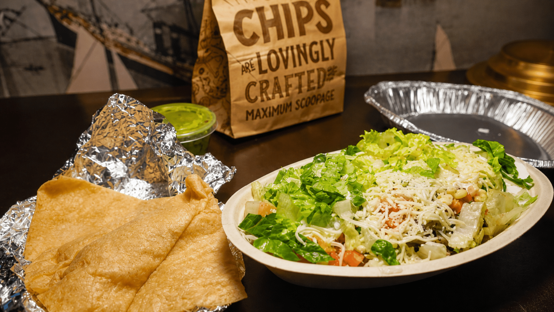 A tabletop view of a Chipotle meal.