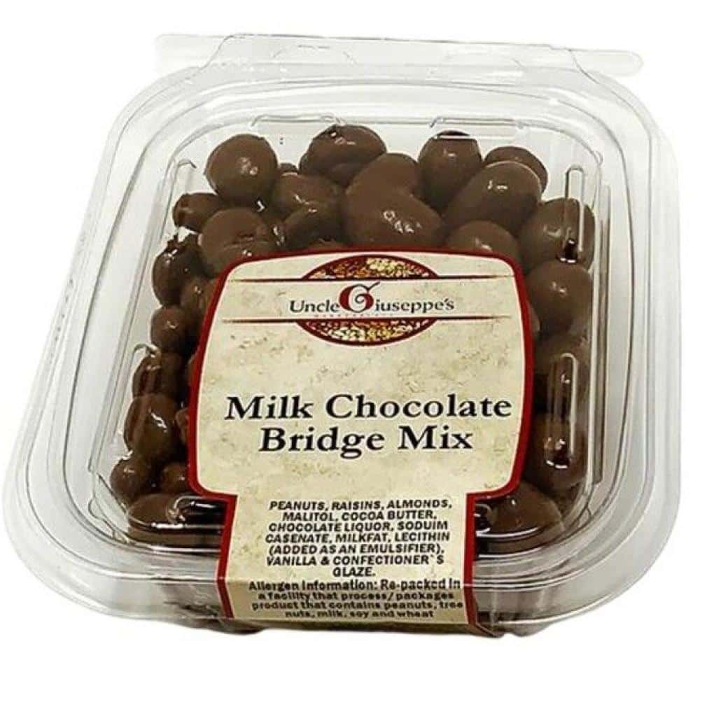 Container of recalled Uncle Giuseppe’s Milk Chocolate Bridge Mix sold in clear plastic packaging.
