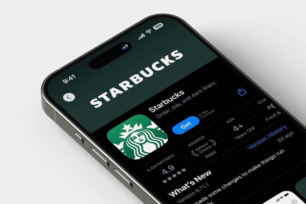 Starbucks mobile app displayed on a smartphone screen in the Apple App Store.