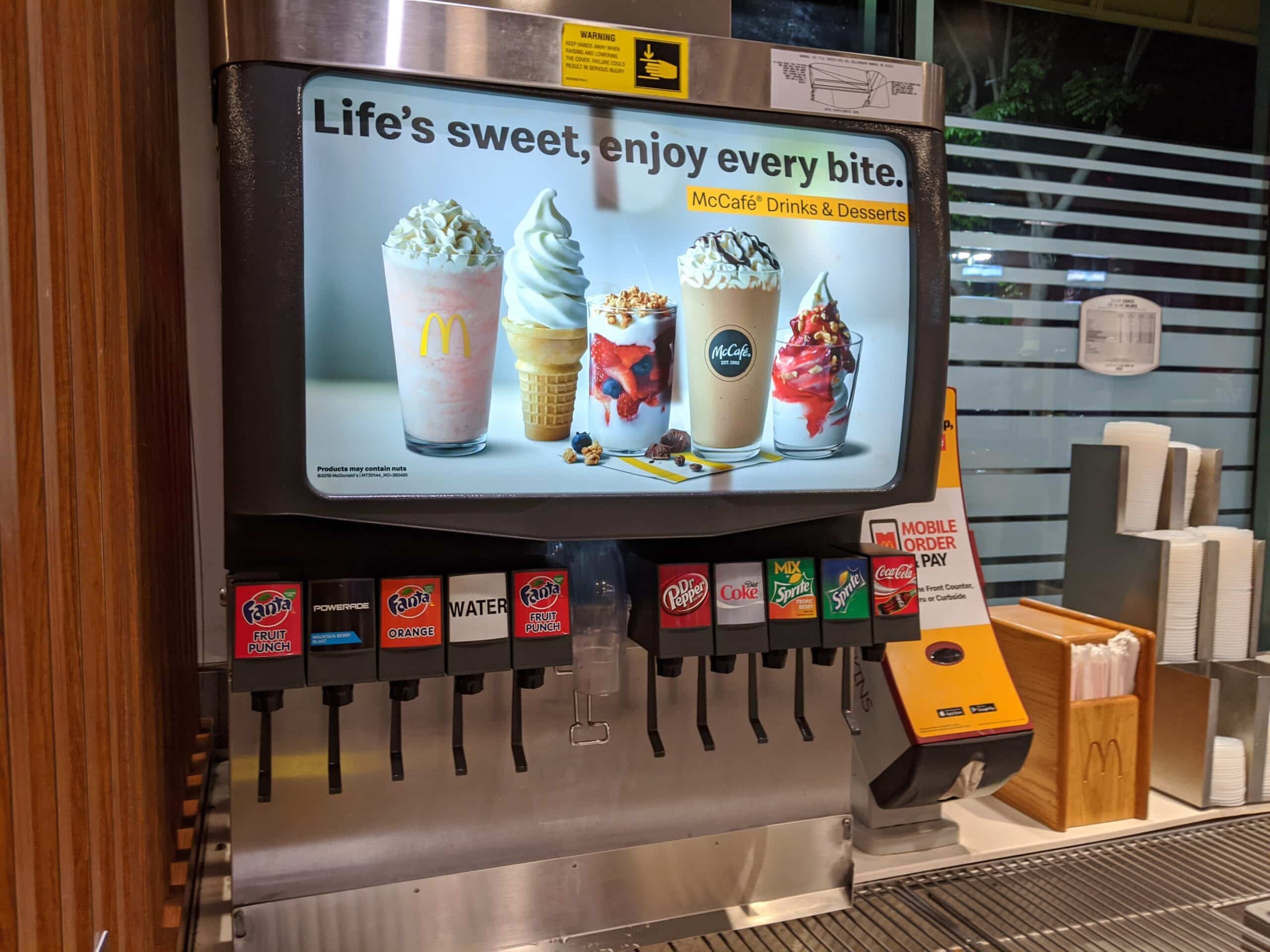 McCafé drinks and desserts displayed inside a McDonald’s restaurant as the chain expands its focus on specialty beverages.