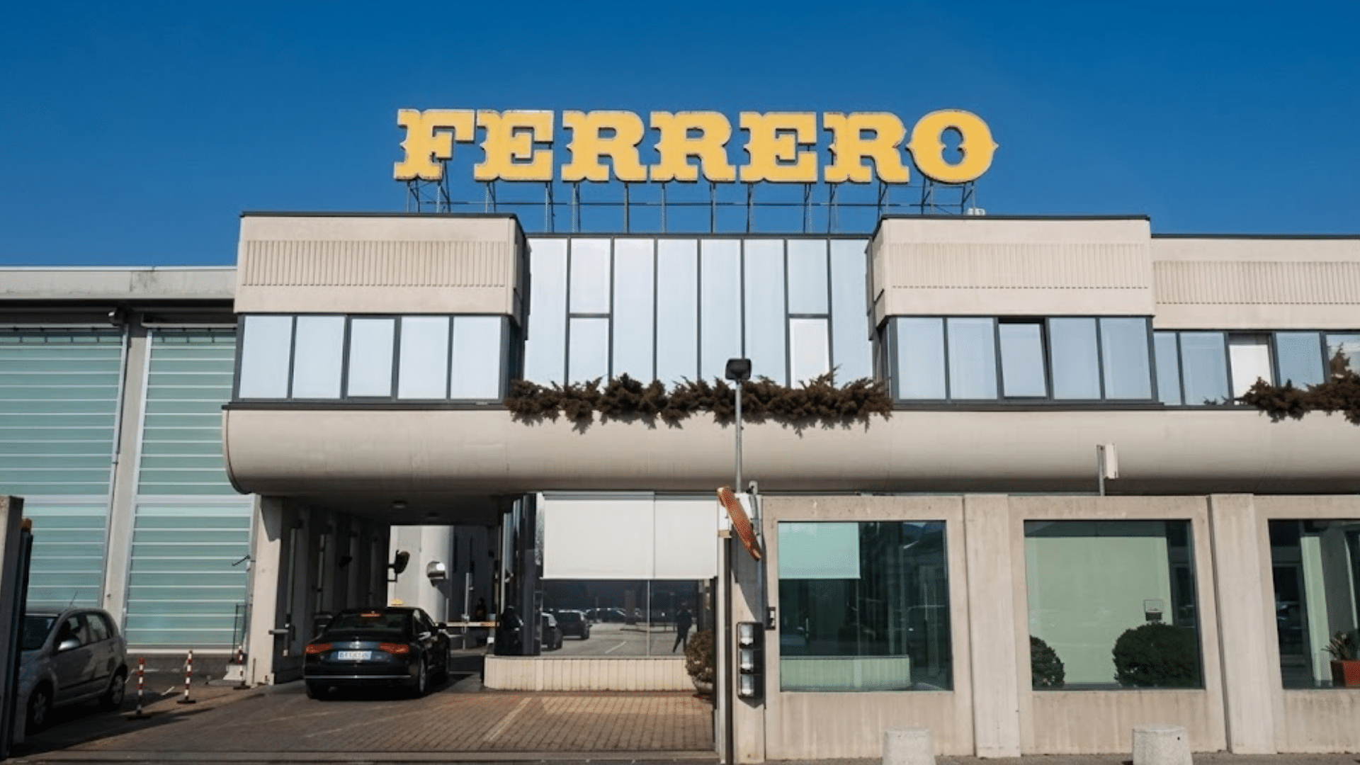 Main entrance to the Ferrero factory building; it is a famous and large worldwide confectionery factory producing Nutella.