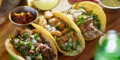 mexican street tacos with barbacoa, carnitas and Chicharrón shot with selective focus